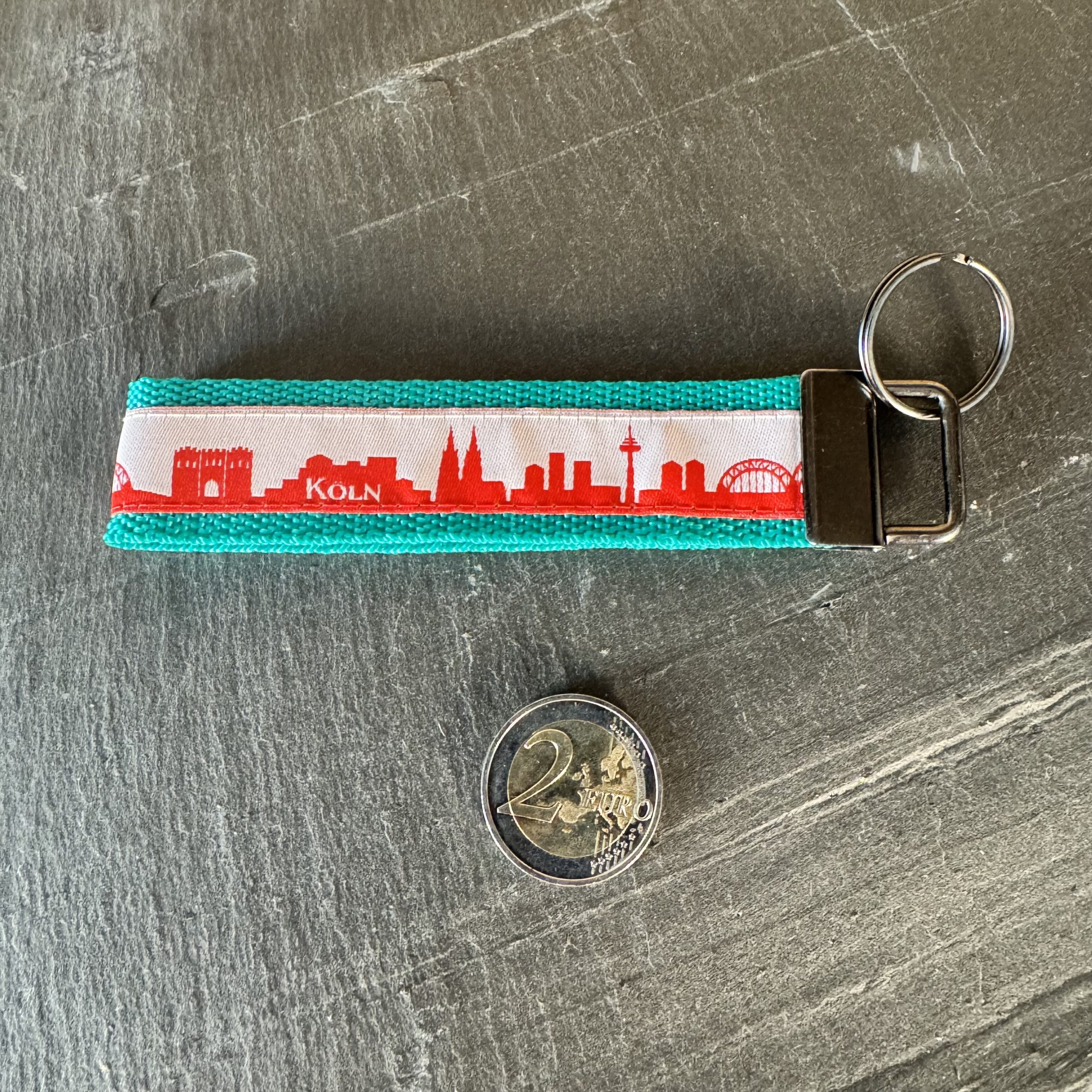 Schlüsselband "Skyline Köln rot / weiß", Gurtband grün