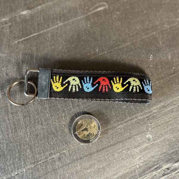 Schlüsselband "Bunte Hände", Gurtband schwarz