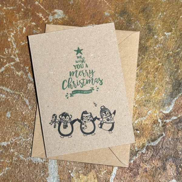 Grußkarte "We wish you a Merry Christmas & tanzende Weihnachts-Pinguine (schwarz)"