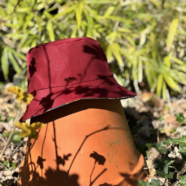 Wende-Sonnenhut aus beschichteter Baumwolle mit Blumenmuster, mit Zopfloch – Bild 4